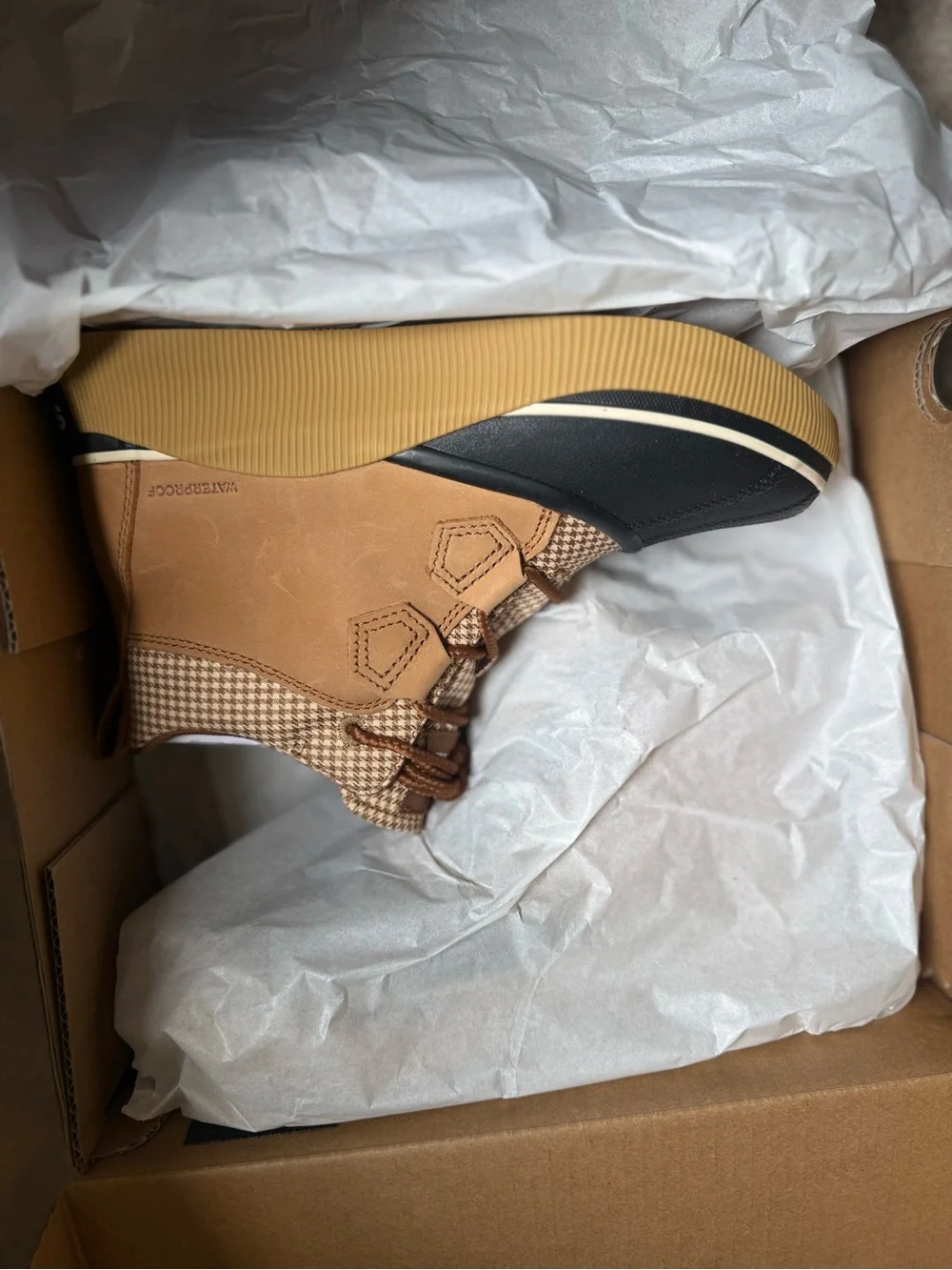 Sorel Out N About™ IV Women's Waterproof Boots in Black & Tan